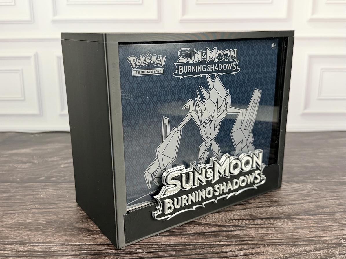 Burning Shadows ETB display case with Elite Trainer Box inside