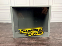Champion's Path ETB display case with yellow raised logo plate