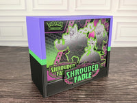 Shrouded Fable ETB display case in purple, green and black with Elite Trainer Box inside