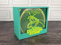 Celestial Storm ETB display case in teal green with the Elite Trainer Box displayed inside