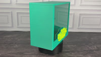 Celestial Storm ETB display case turntable video showing the teal green frame, raised logo and magnetic front